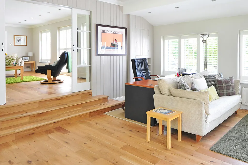 wood floor living room white sofa What Is Floor Refinishing and Why Does It Matter