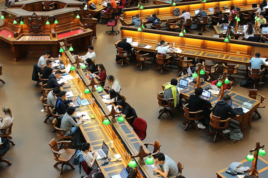 People seated on three large tables The Impact of a Clean Campus: A Magnet for Success